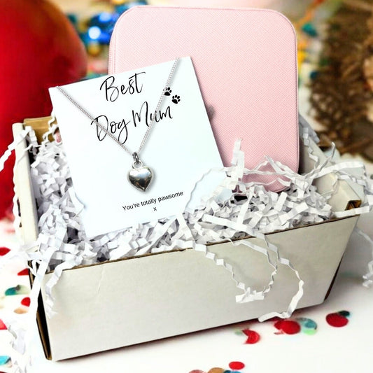 Puffed heart pendant on a fine silver chain, displayed on a Best Dog Mum card reading You're totally pawsome, in a gift box with a pink zip up jewellery case.