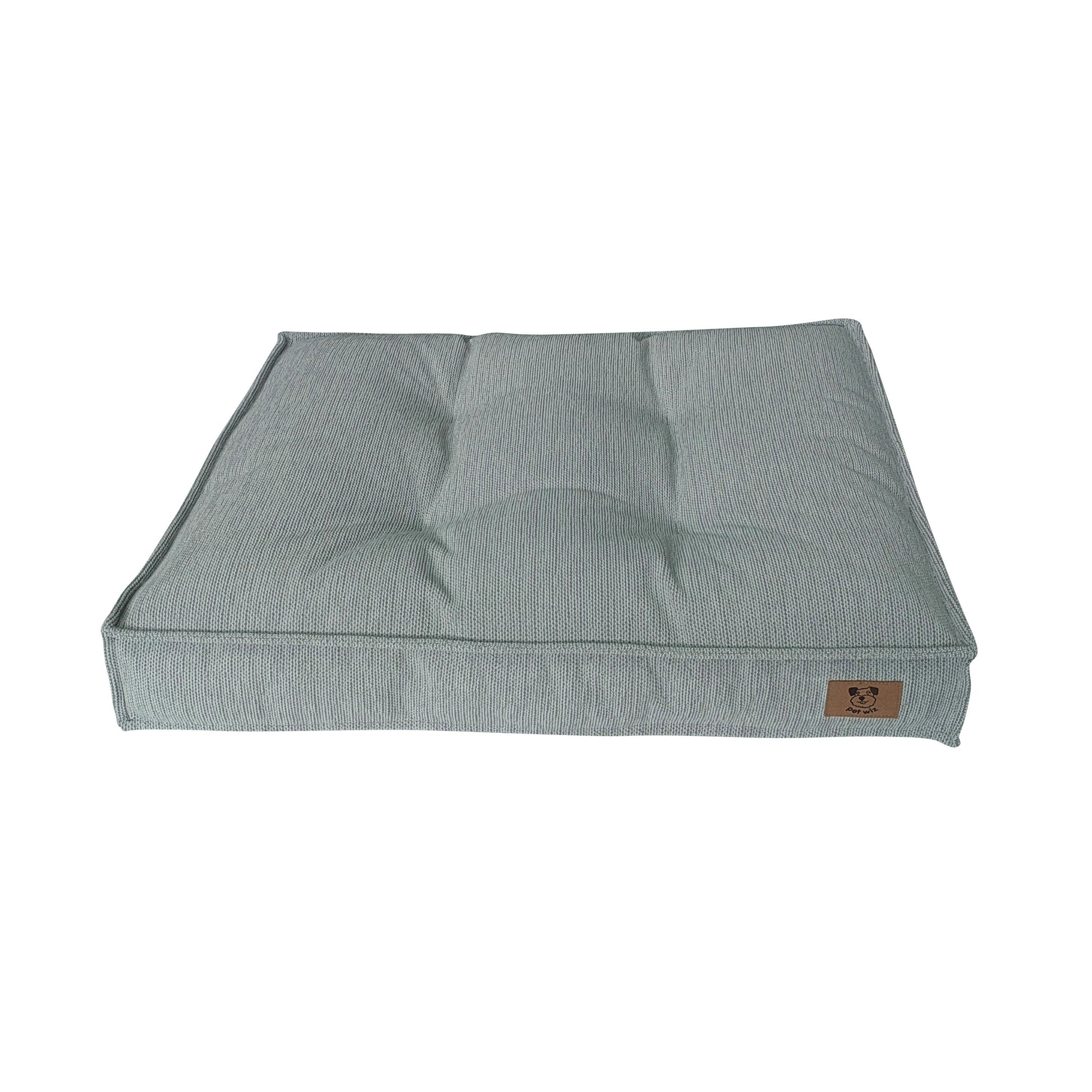 Front view of the Pet Wiz padded dog bed showing the full sleeping surface