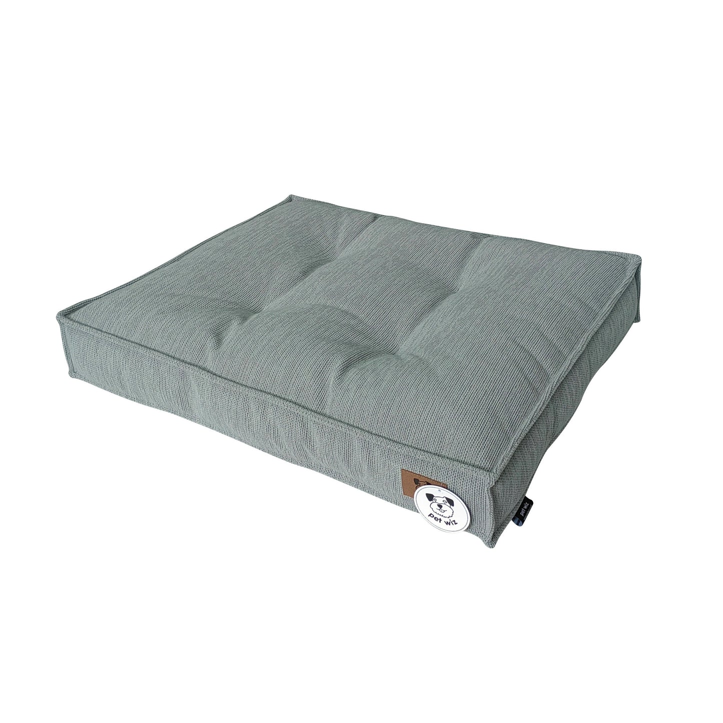 Light grey padded dog bed with removable cover, side view