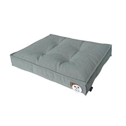 Light grey padded dog bed with removable cover, side view