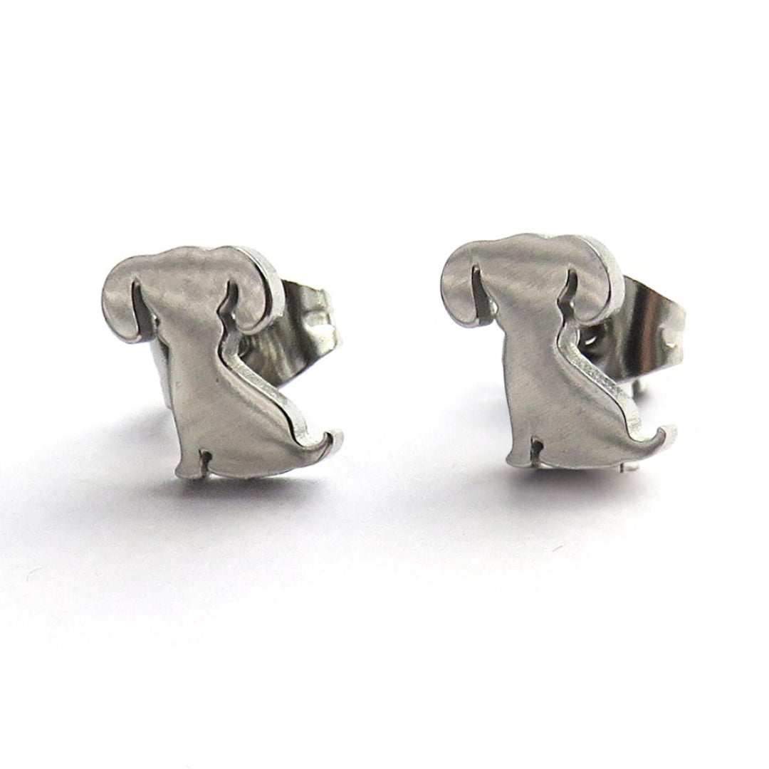 A pair of puppy dog shaped stud earrings in brushed stainless steel with butterfly backs