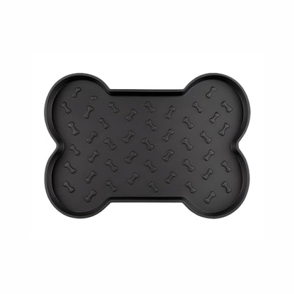 Black bone-shaped dog feeding mat with a slip-resistant, bone-embossed surface