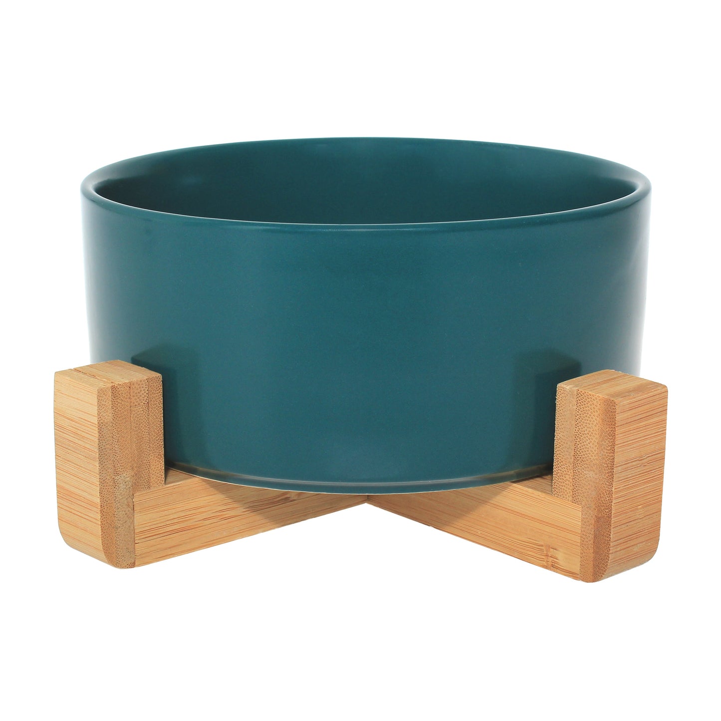Duke & Milo raised ceramic dog bowl in jade green, sitting in its bamboo stand
