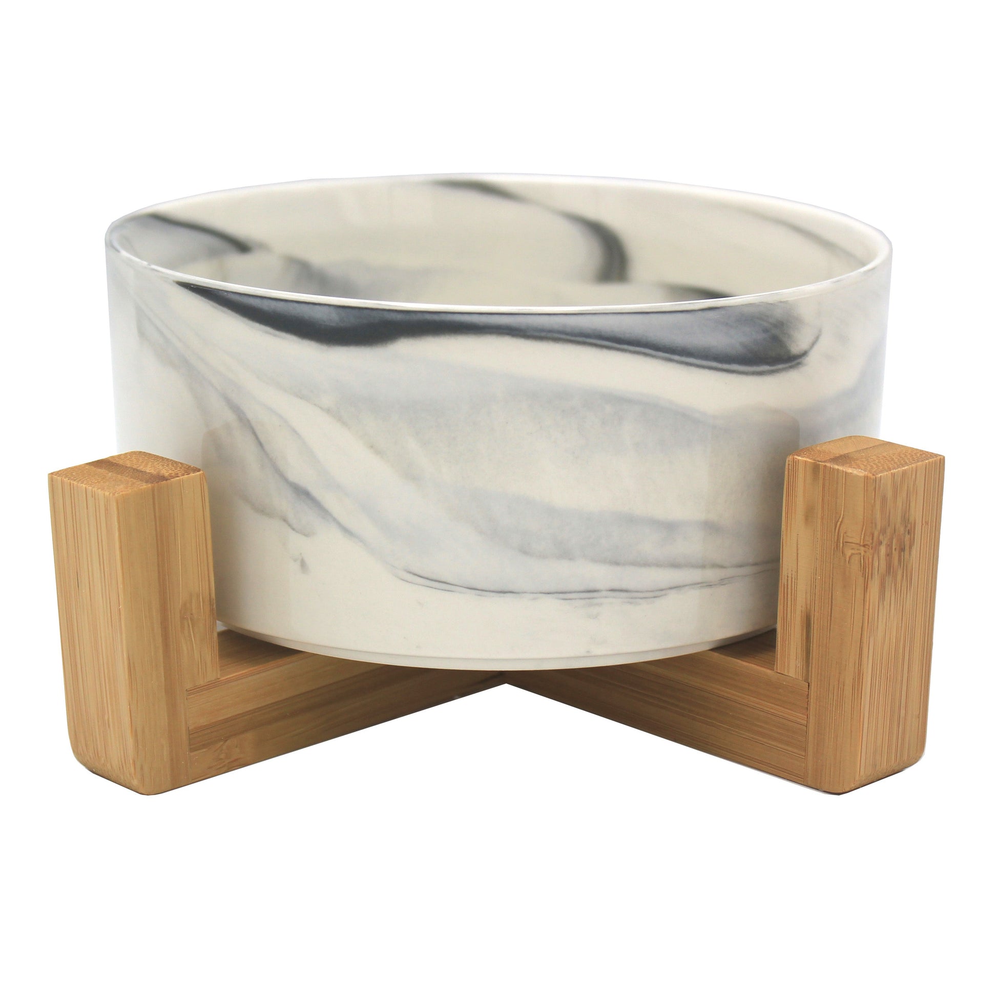 Duke & Milo raised ceramic dog bowl in marble grey, sitting in its bamboo stand