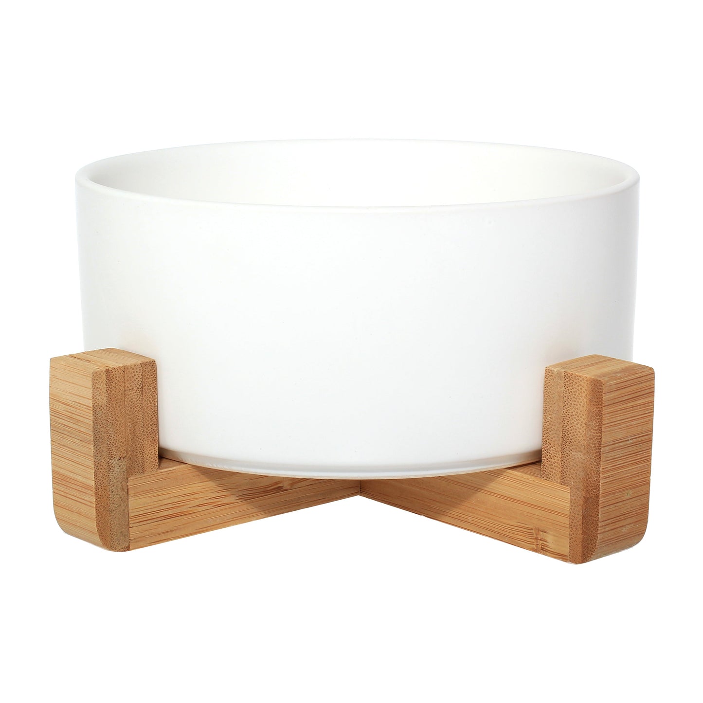 Duke & Milo raised ceramic dog bowl in white, sitting in its bamboo stand