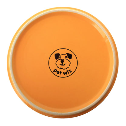Underside of the yellow ceramic dog bowl from the Duke & Milo bamboo stand set