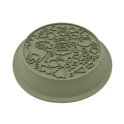 Angled view of the lick mat side of the green festive dog bowl, from Duke & Milo