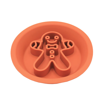 Orange gingerbread man slow feeder side of the festive dog bowl, from Duke & Milo