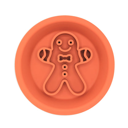 Gingerbread man festive slow feeder dog bowl in orange, from Duke & Milo