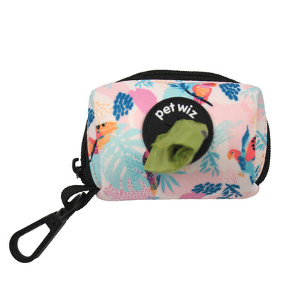 Pink parrot print poo bag holder with a bag pulled through the dispenser