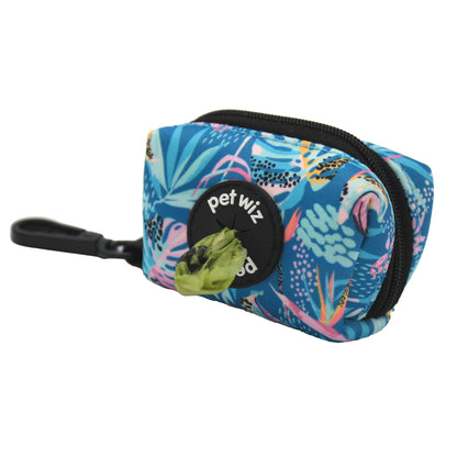 Tropical print poo bag holder with a bag being pulled from the dispenser