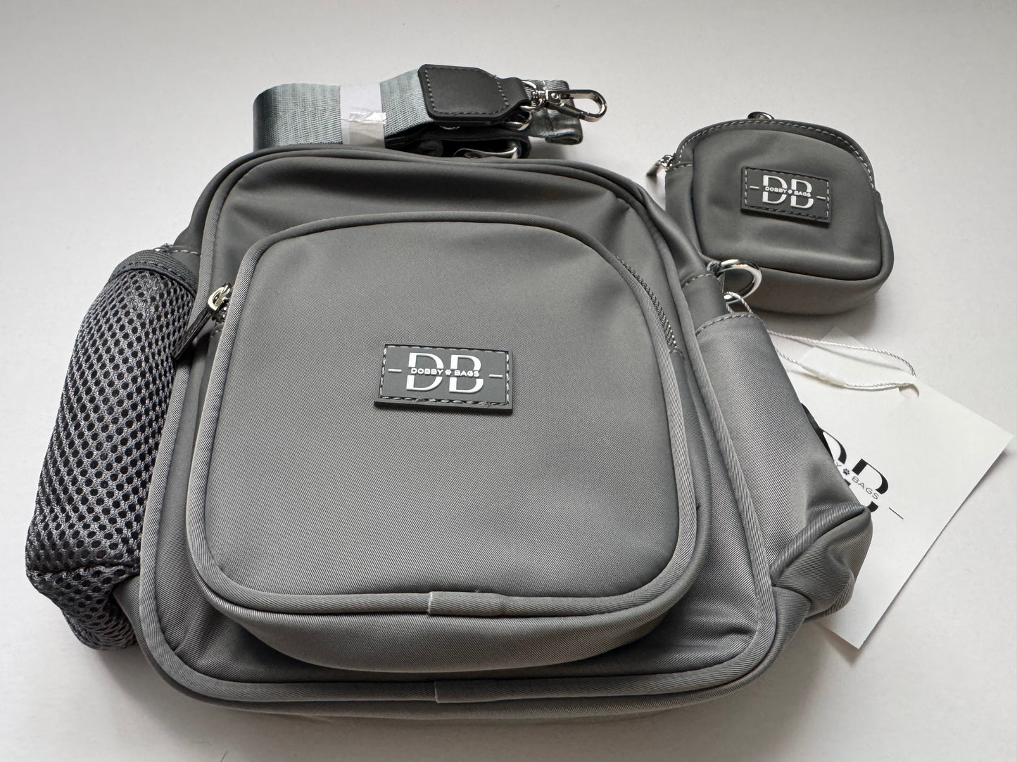 The PEBBLE grey dog walking bag with adjustable strap extending to 136cm