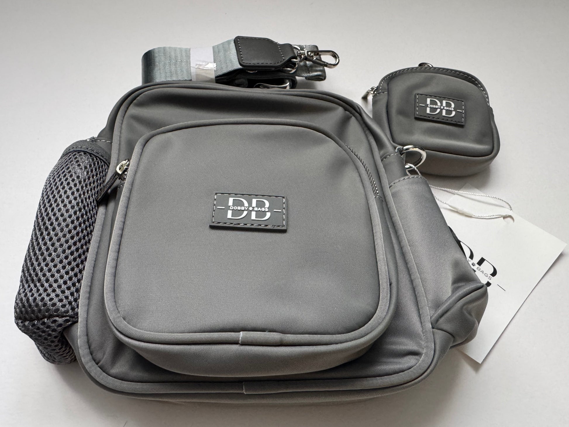 The PEBBLE grey dog walking bag with adjustable strap extending to 136cm