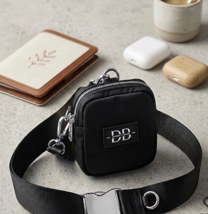 The OG matching black treat pouch clipped onto the adjustable webbing strap