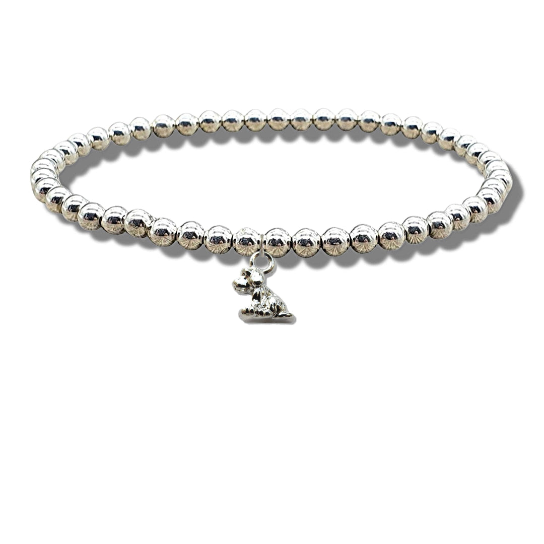 Little dog charm beaded bracelet with silver plated beads on stretch elastic and a small silver plated dog charm