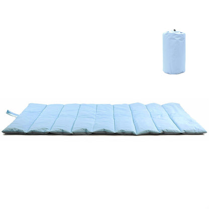 Baby blue roll-up dog travel mat laid flat beside its matching carry case